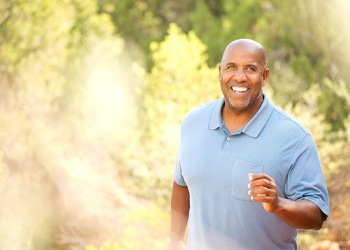 man smiling walking