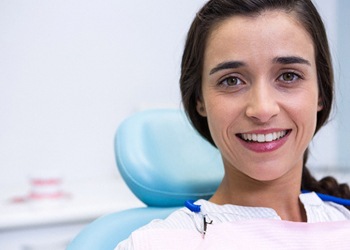 Woman smiling in dental chair